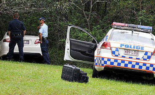 POLICE investigate a stolen car dumped in bush behind the Ten Pin bowling centre. POLICE investigate a stolen car dumped in bush behind the Ten Pin bowling centre.